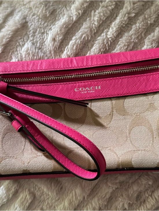 Coach Handbags - Coach Beige Signature Canvas Wristlet with Bright Pink Trim